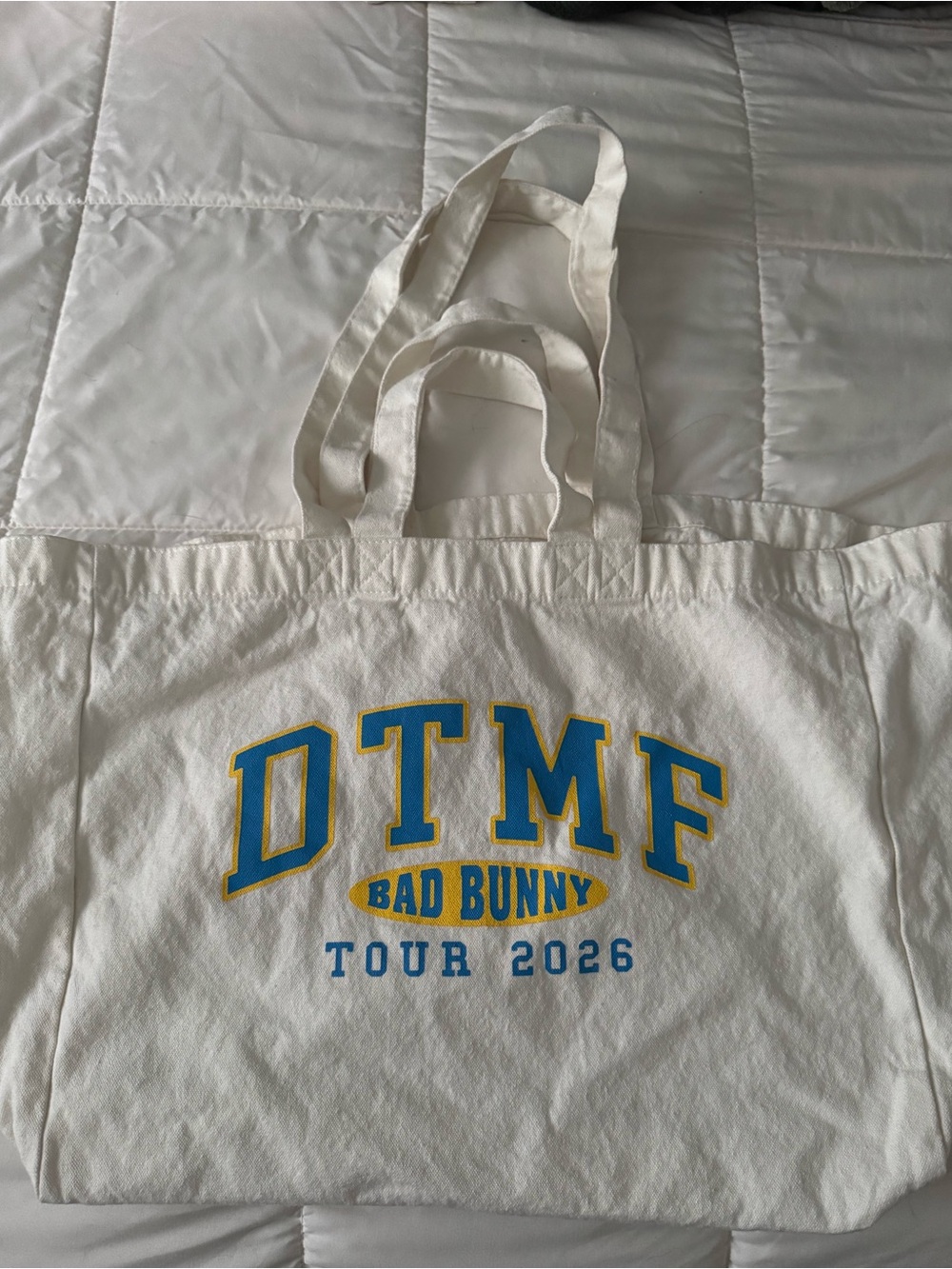 White Canvas Tote with Blue and Yellow Tour Graphic